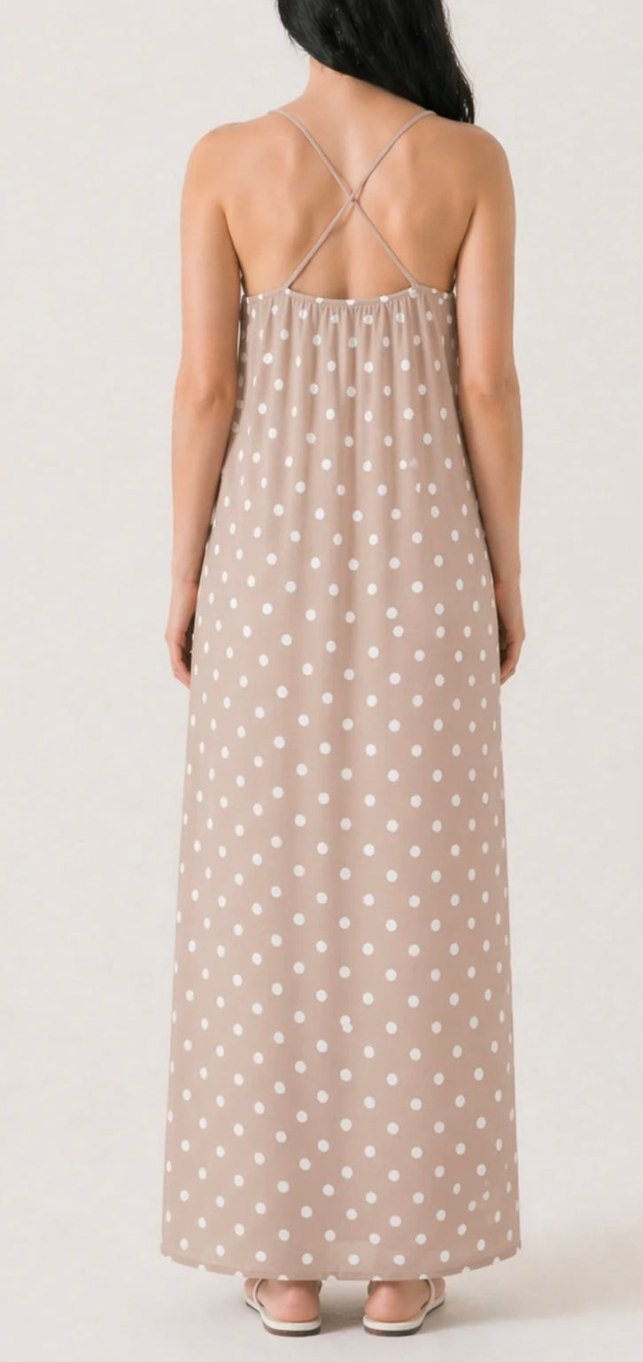 Milan beautiful  soft non crease cami dress with stretch back and side splits. 

One size fits 10-16/18

Polyester elastane