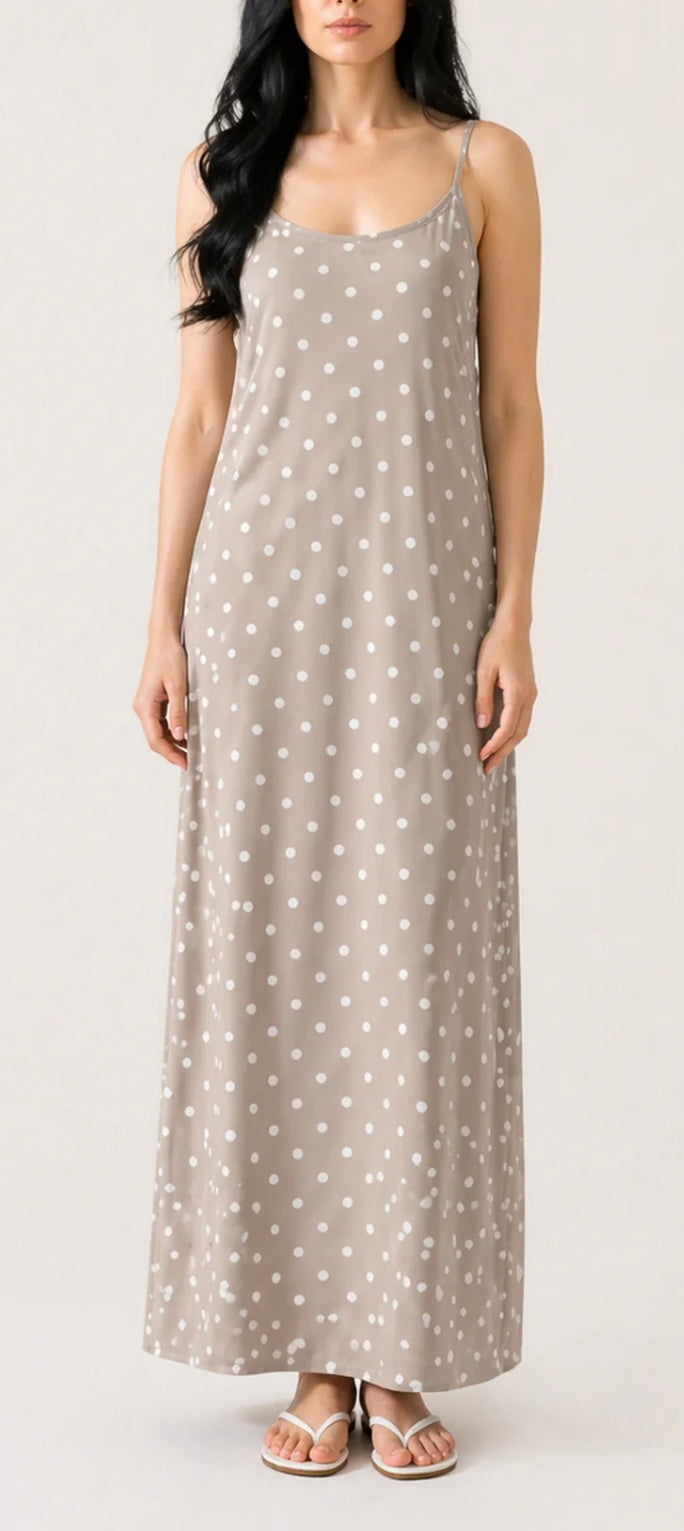 Milan beautiful  soft non crease cami dress with stretch back and side splits. 

One size fits 10-16/18

Polyester elastane