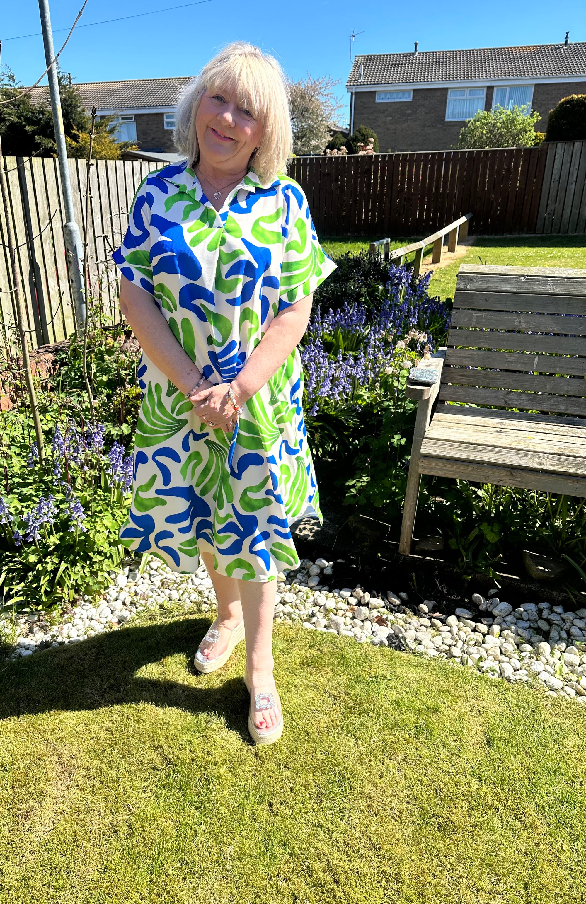 Helena Stunning non crease dress with pockets. 

One size fits 10-20