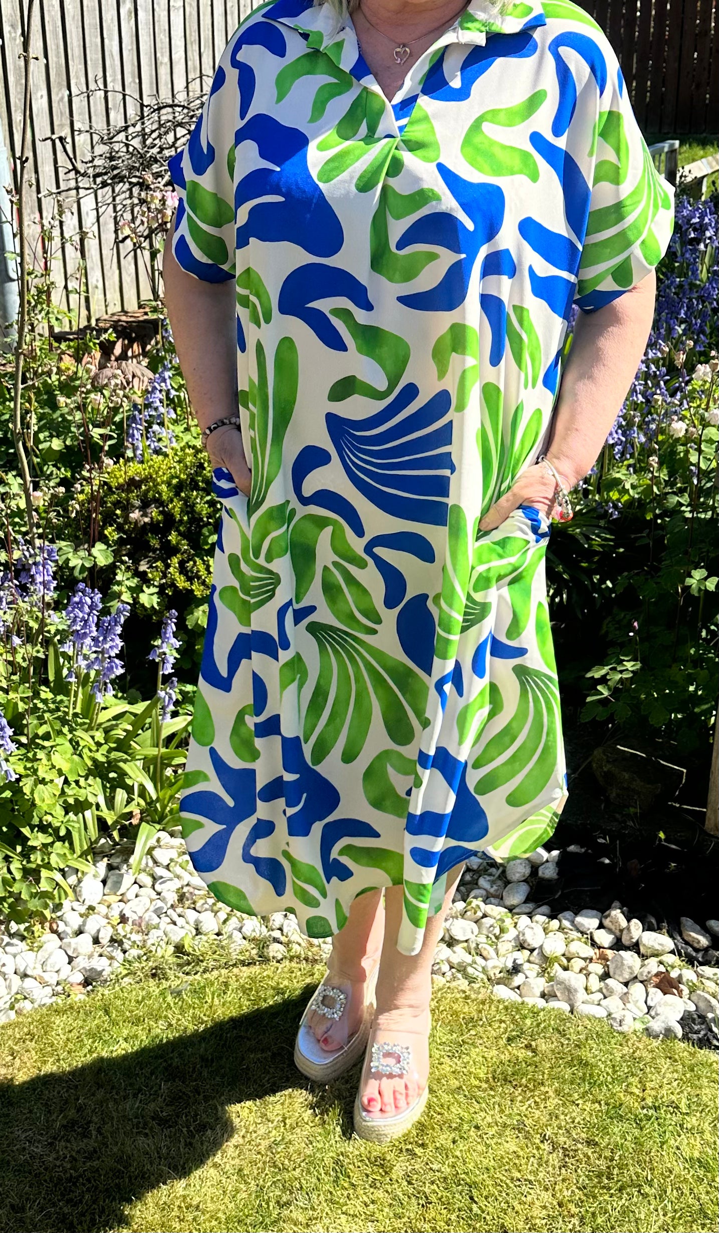 Helena Stunning non crease dress with pockets. 

One size fits 10-20