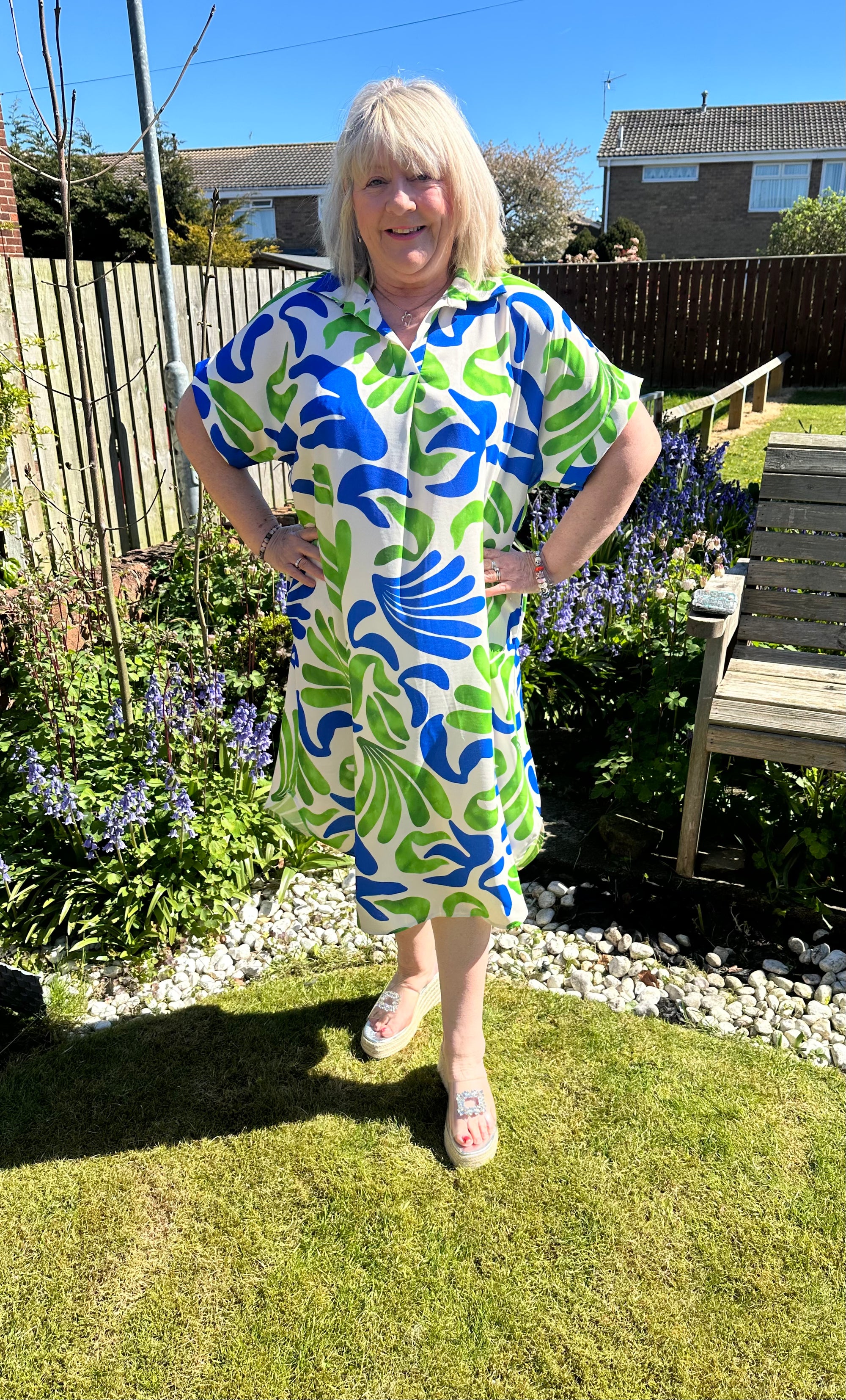 Helena Stunning non crease dress with pockets. 

One size fits 10-20