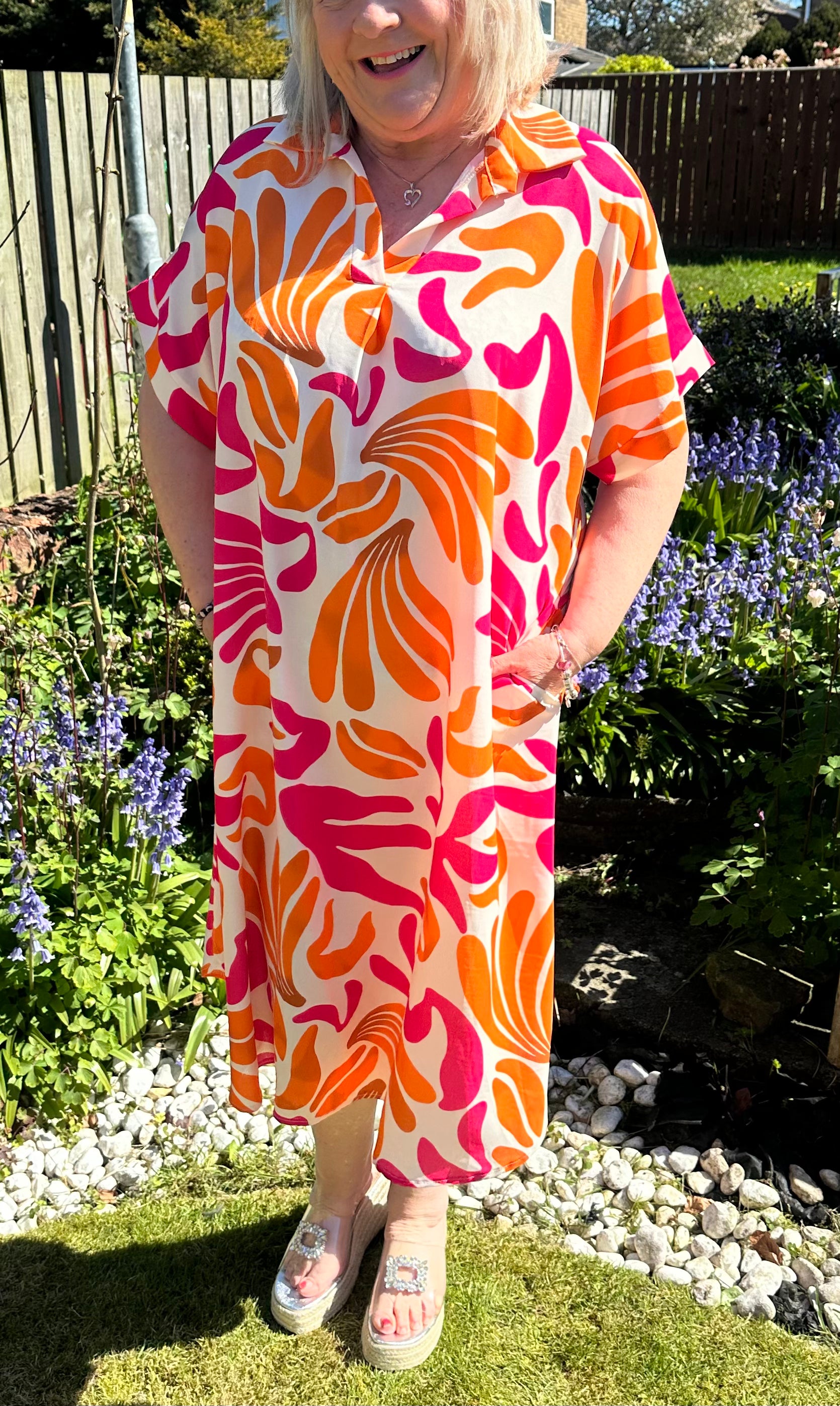 Helena Stunning non crease dress with pockets. 

One size fits 10-20