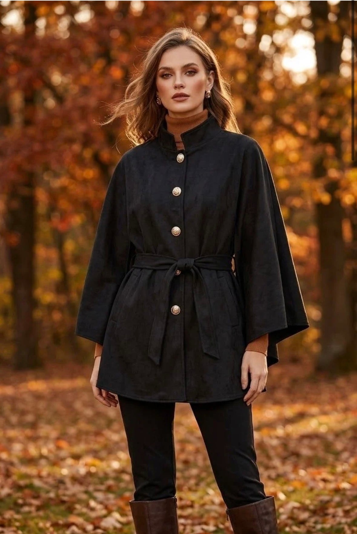 Maria Stunning soft suedette cape with military buttons. 
One size fits 10-22