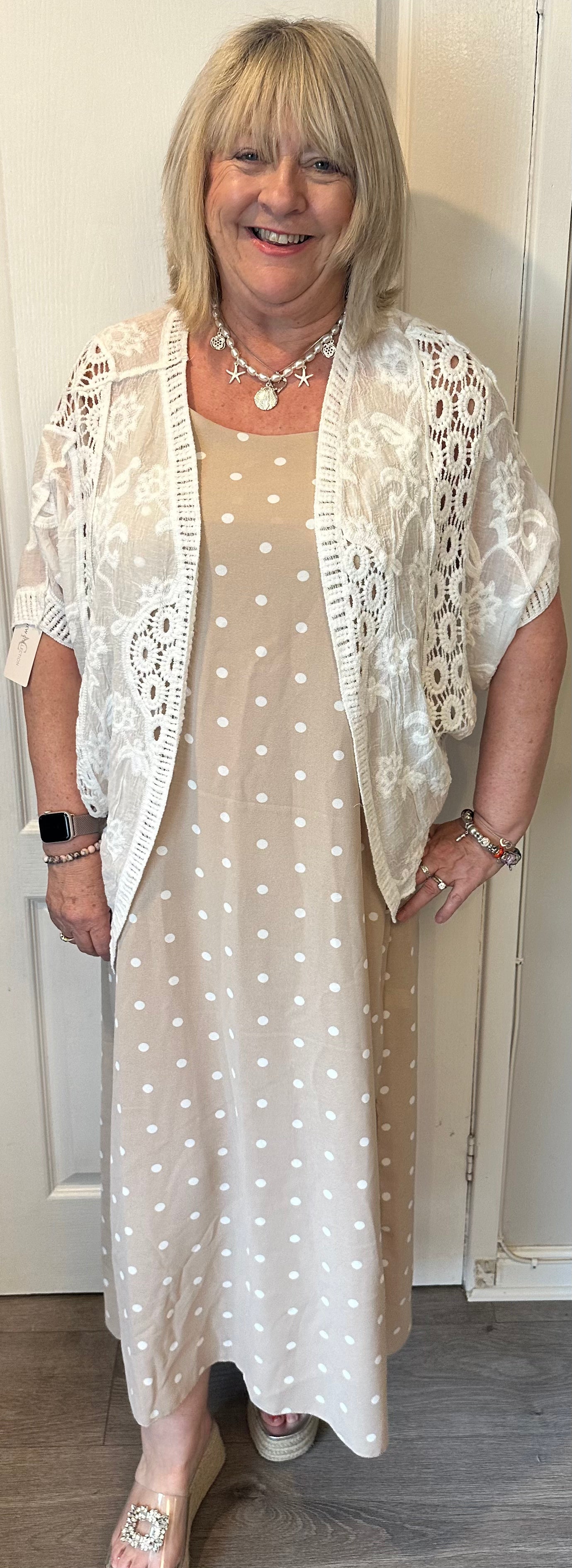 Milan beautiful  soft non crease cami dress with stretch back and side splits. 

One size fits 10-16/18

Polyester elastane