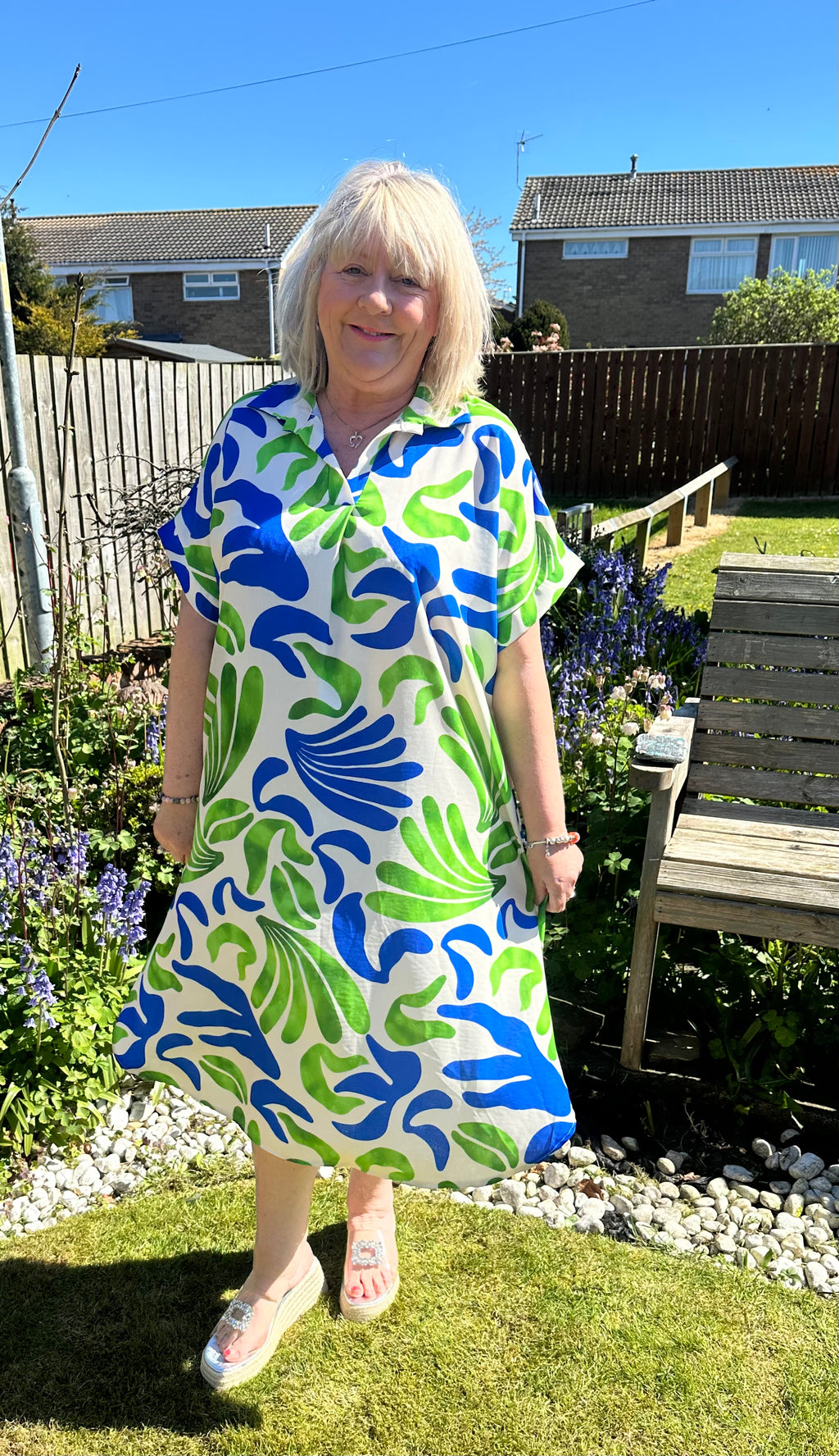 Helena Stunning non crease dress with pockets. 

One size fits 10-20
