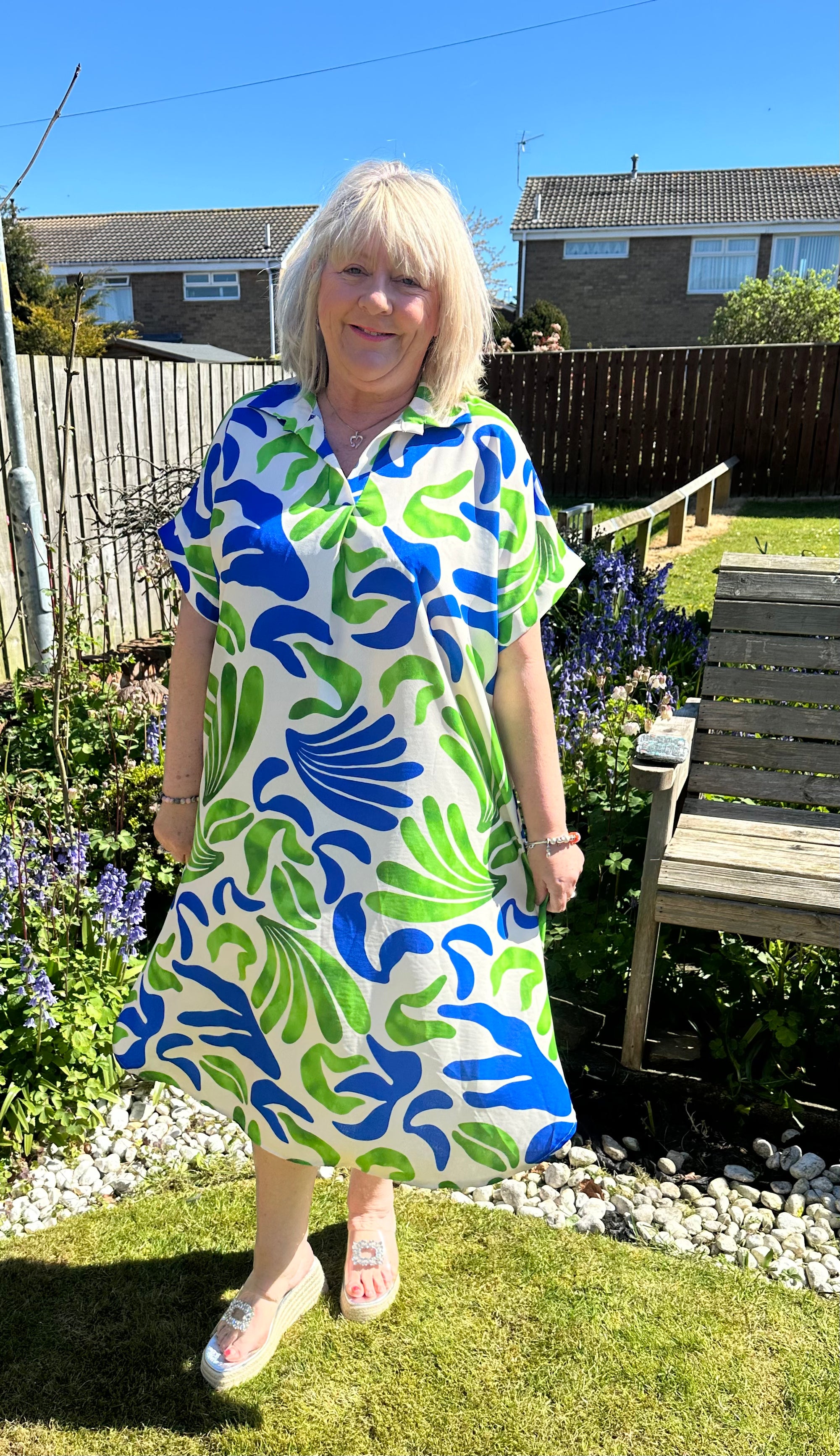 Helena Stunning non crease dress with pockets. 

One size fits 10-20